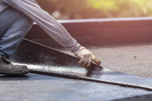 Professional Basement Waterproofing technician working in Freetown, IN